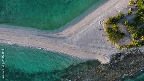 Aerial view of tropical paradise beach with crystal clear water and palm trees, Kalanggaman Island, Philippines. photo