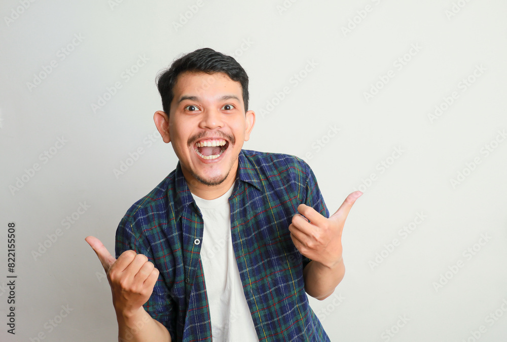 happy asian young man with open arms happy asian young man with open arms