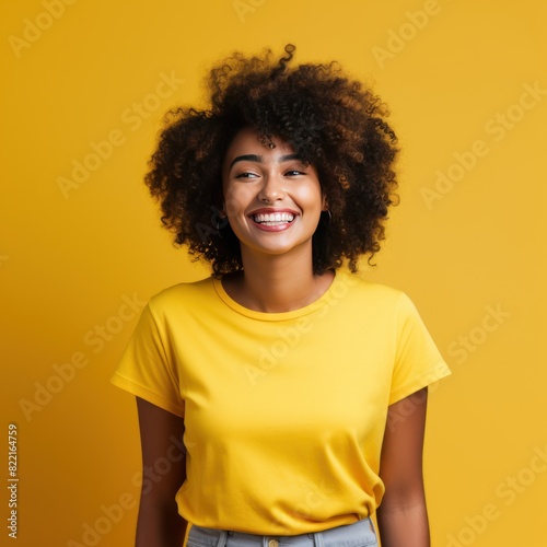 Yellow background Happy black independant powerful Woman Portrait of young beautiful Smiling girl good mood Isolated on Background 