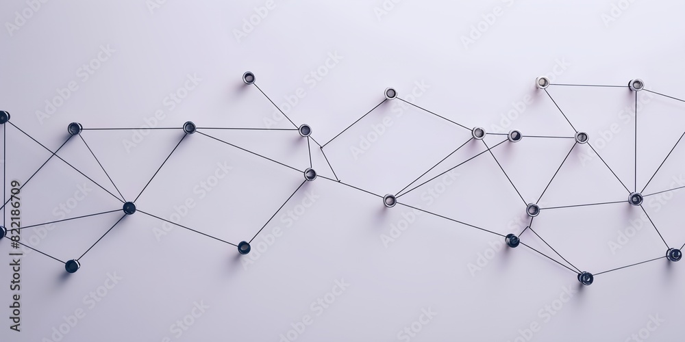 a group of pins connected to a white wall a group of pins connected to a white wall