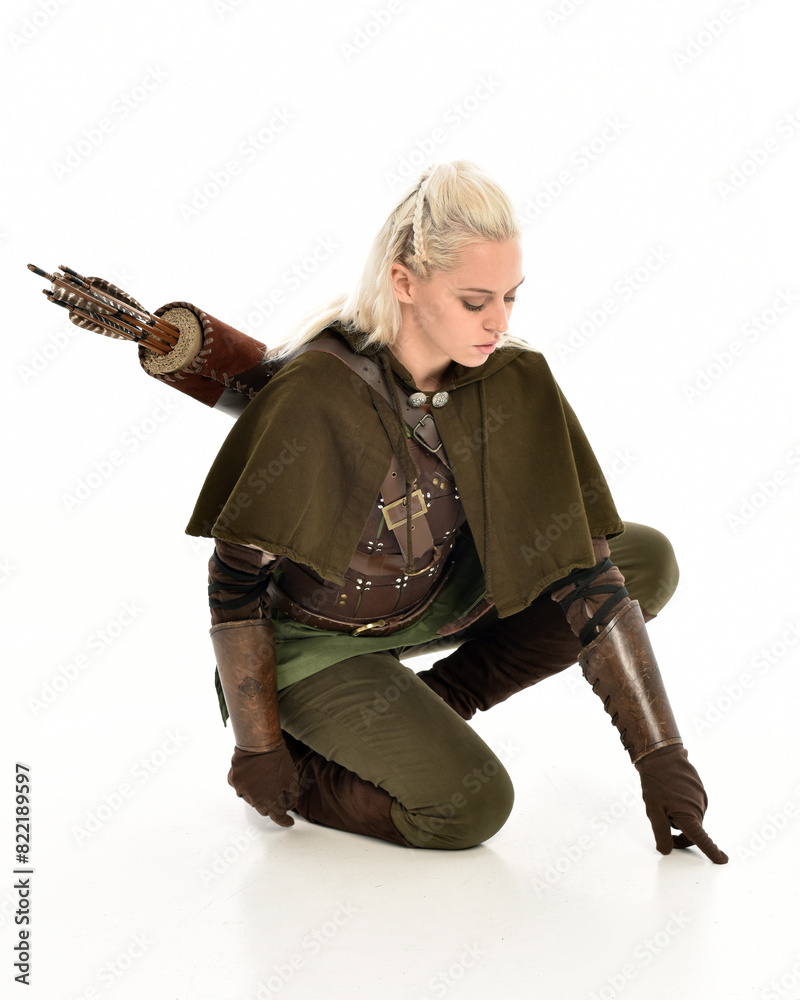 full length portrait of blonde female model wearing green fantasy elf ...