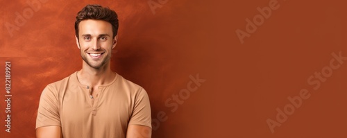 Brown background Happy european white man realistic person portrait of young beautiful Smiling man good mood Isolated on Background Banner with copyspace 
