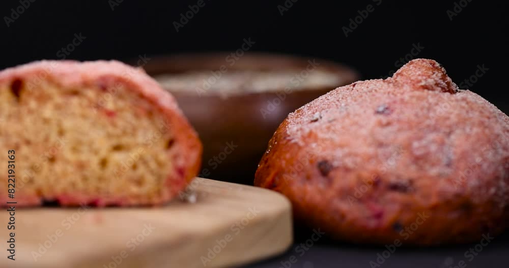 a fresh red round bun on the table, a red bun with the addition of red beetroot vegetables
