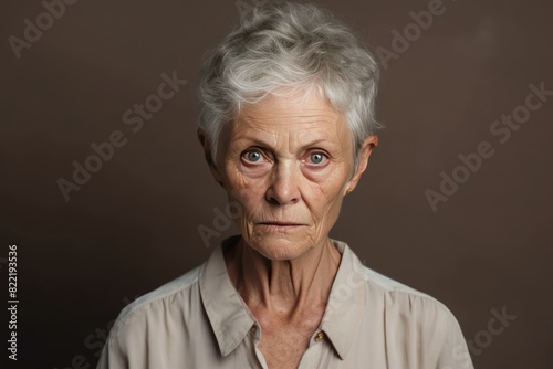 Brown background sad European white Woman grandmother realistic person portrait of young beautiful bad mood expression Woman Isolated Background 