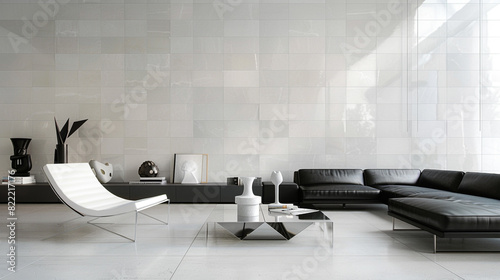 A contemporary minimalist living room with large white porcelain tiles on the walls, a streamlined black leather sofa, and a geometric metal coffee table © Anita