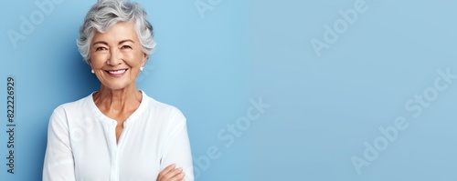 Indigo background Happy european white Woman grandmother realistic person portrait of young beautiful Smiling Woman Isolated on Background Banner  photo
