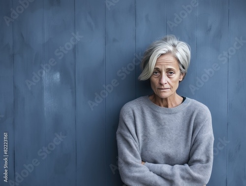 Indigo background sad European white Woman grandmother realistic person portrait of young beautiful bad mood expression Woman 