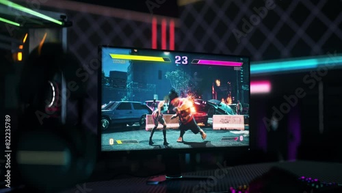 Playing the newest fighting simulator on the modern computer gaming screen. Animation of the fighter characters on the gaming screen. Defeat screen after the loss in a fight gaming round. Hobby. photo