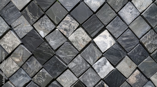 Textured black and gray stone tiles pattern for background