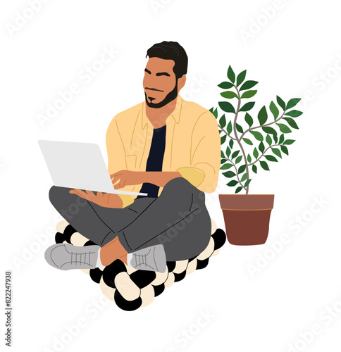 Business man sitting on floor pillow, working on laptop. Guy wearing casual clothes, yellow shirt and black pants. Concept of remote work, freelance, selfemployment. Vector illustration isolated. photo
