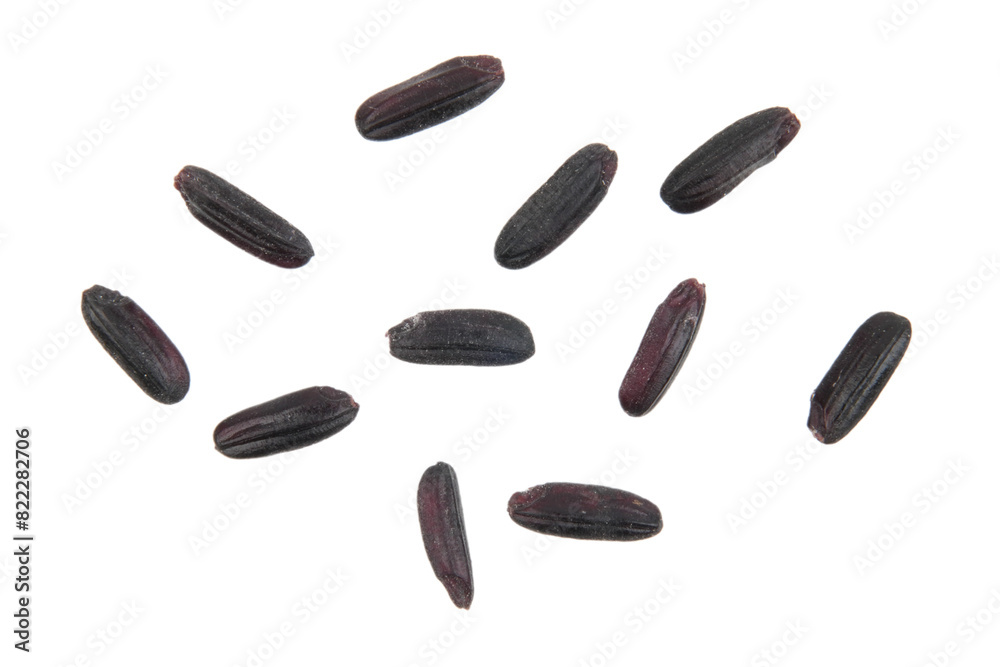 a close up look of many black rice grains scattered over isolated transparent a close up look of many black rice grains scattered over isolated transparent