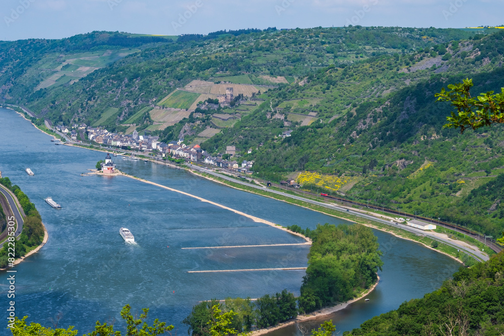 View from a hiking trail in the Rheingau Mountains near Lorch down into the Rhine Valley on a sunny spring day View from a hiking trail in the Rheingau Mountains near Lorch down into the Rhine Valley on a sunny spring day