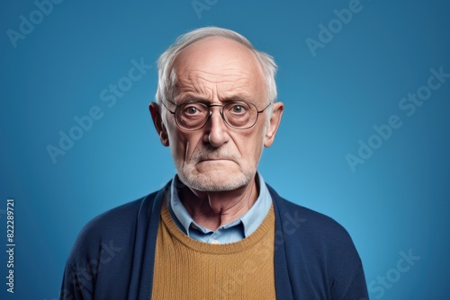 Navy background sad european white man grandfather realistic person portrait older person beautiful bad mood old man Isolated on Background ethnic 