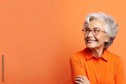 Orange background Happy european white Woman grandmother realistic person portrait of young beautiful Smiling Woman Isolated on Background Banner