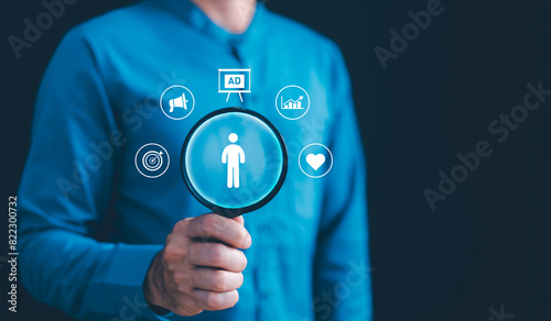 Obraz na płótnie Target customer, buyer persona, customer behavior concept. Marketing plan and strategies. Personalization marketing, customer centric strategies. Businessman showing on screen to target customer. w salonie