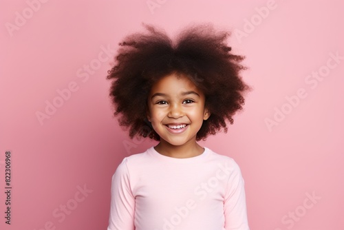 Pink background Happy black american african child Portrait of young beautiful kid Isolated on Background ethnic diversity equality acceptance  © Zickert