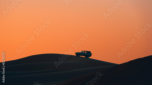A japanese vintage off road four wheel drive SUV Cruiser overlands in a desert, the sky silhouettes a classic off road overloading 4WD vehicle - off roading, trek in the open land - snorkel