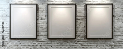 In a modern architectural studio, three empty white frames with dark borders are displayed against a textured white brick wall. 