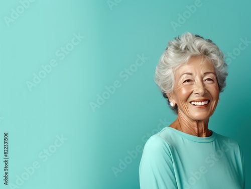 Teal background Happy european white Woman grandmother realistic person portrait of young beautiful Smiling Woman Isolated on Background Banner