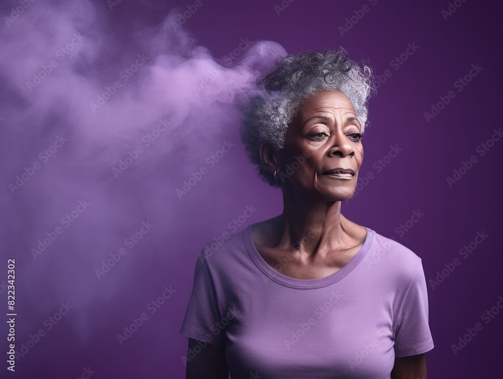 Violet background sad black American independent powerful Woman. Portrait of older mid-aged person beautiful bad mood expression girl Isolated