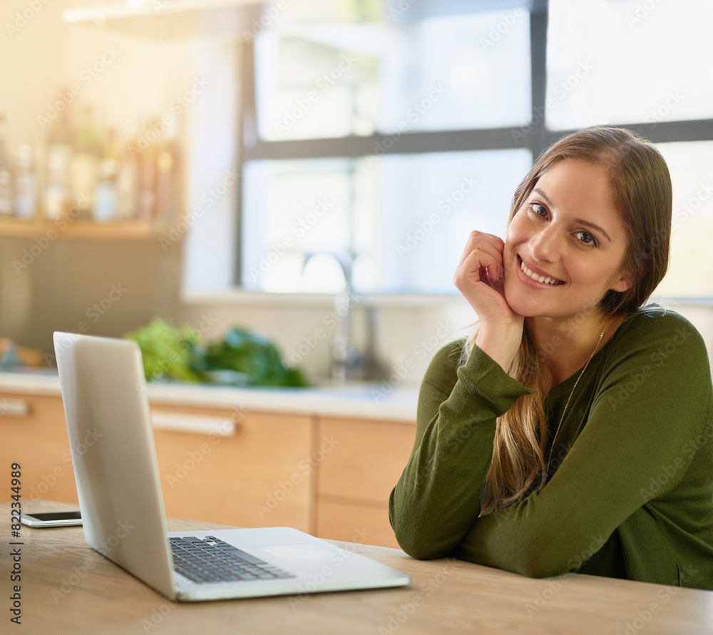 Kitchen, smile and portrait of woman with laptop on table for freelance job, research and project. Happy, female person and relax with technology at home for remote work, communication and networking Kitchen, smile and portrait of woman with laptop on table for freelance job, research and project. Happy, female person and relax with technology at home for remote work, communication and networking