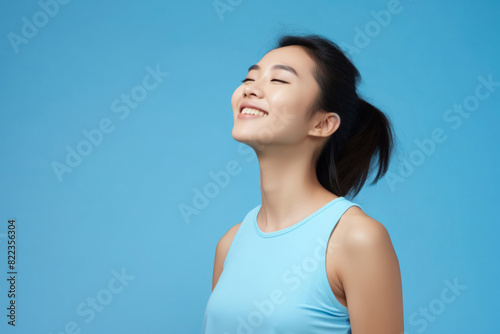 portrait of a girl in good shape and good spirits, feeling great after sports and yoga, background, copy