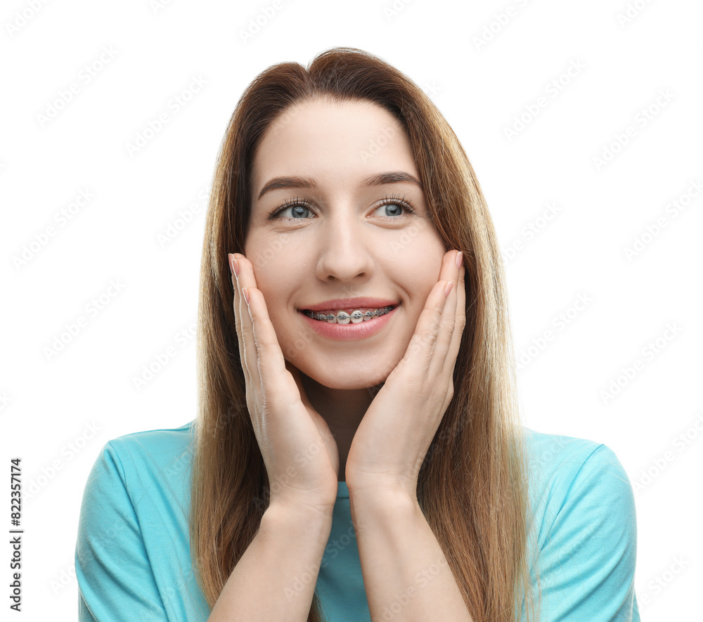 Portrait of smiling woman with dental braces on white background Portrait of smiling woman with dental braces on white background