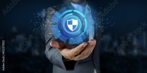 cybersecurity concept, Businessman's Hand Concept Cyber security Guard Security sign on visual screen for technology Security.	