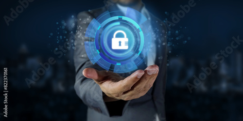 cybersecurity concept, Businessman's Hand Concept Cyber security Lock Security sign on visual screen for technology Security.	