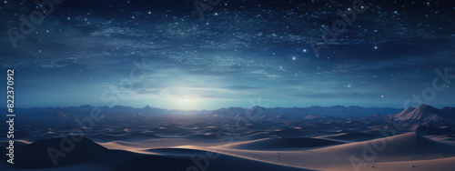 Sand dunes under moon and star filled sky with clouds  night dramatic desert landscape