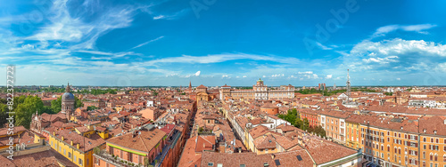 Panoramic view of Modena's vibrant downtown, captured from the iconic Ghirlandina bell tower, showcasing the Ducal Palace of Military Academy and historic architectures