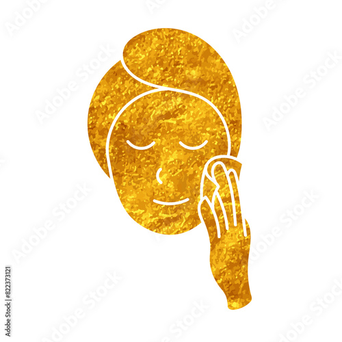 Woman applying facial treatment product drawing in gold color style