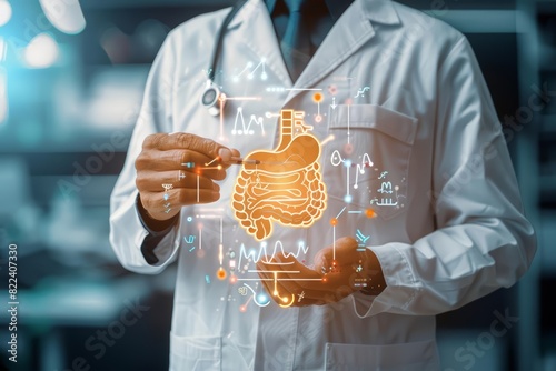 Closeup half body of a gastroenterologist reviewing digestive system diagrams