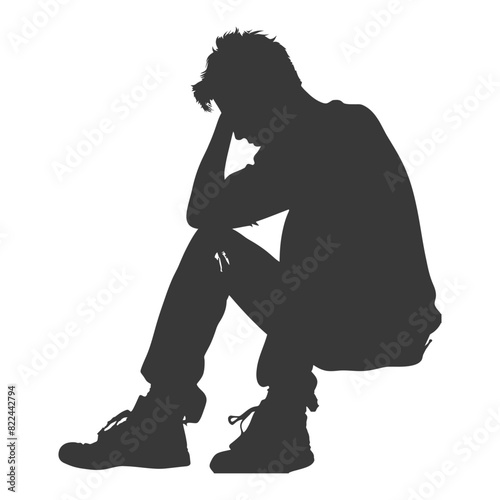 Silhouette sad man sitting alone depressed sitting black color only