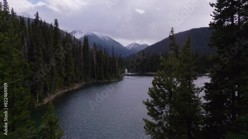 Drone in manning park flying around lake with mountains in the background photo