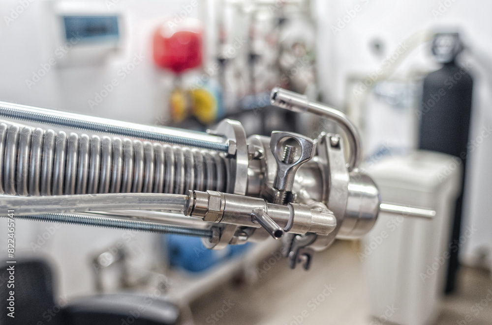 Shiny pipes of unit for distilling alcohol at home Shiny pipes of unit for distilling alcohol at home
