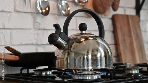 Kettle on a gas stove. Brew tea. Boil the kettle. Boiling water.