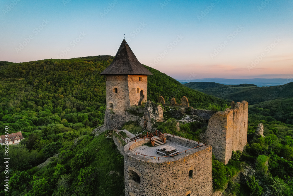 Ruins of a medieval castle Somoska or Somoskoi var. on borders of southern Slovakia and Hungary at sunrise time. Ruins of a medieval castle Somoska or Somoskoi var. on borders of southern Slovakia and Hungary at sunrise time.