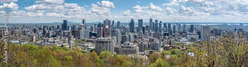 Large high resolution panorama view of downtown Montreal skyline on a beautiful spring day, province of Quebec, Canada. High quality photo taken from Kondiaronk Belvere lookout, Mount Royal (May 2024) photo
