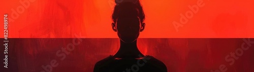 A dark figure stands in front of a red background. The figure is faceless.