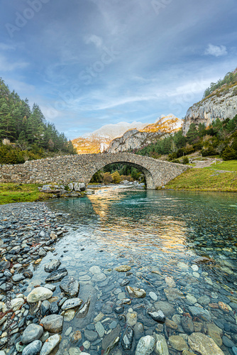 The Bujaruelo Bridge is a 13th century Romanesque bridge over the Ara River, in the province of Huesca, in the Aragonese Pyrenees.