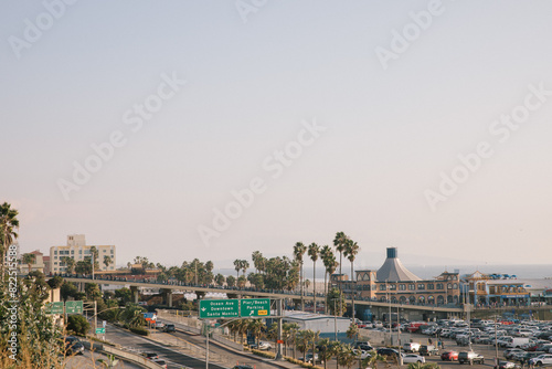 View of Santa Monica Pier and Pacific Coast Highway 1 from Palisades Park at dusk.  photo