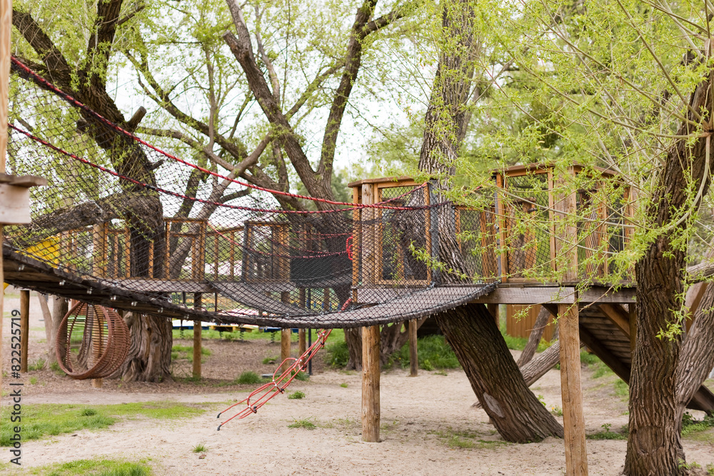 Wooden playground outdoors in the park