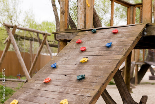 Climbing wall at wooden playground