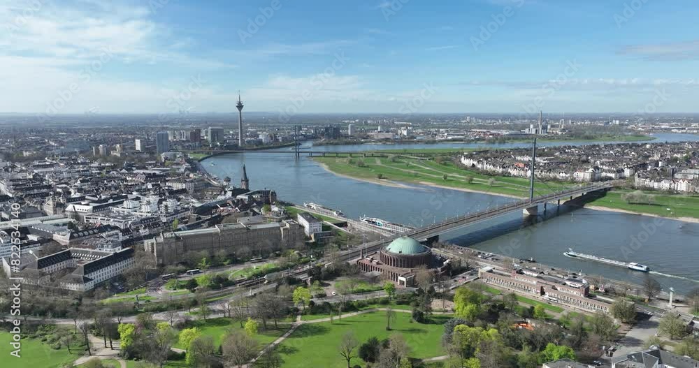 Aerial view over Dusseldorf, tv tower, Rheinknie bridge, buildings and metropolis. Aerial view over Dusseldorf, tv tower, Rheinknie bridge, buildings and metropolis.