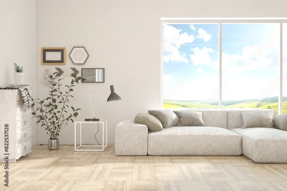 Fototapeta premium White living room with sofa and summer landscape in window. Scandinavian interior design. 3D illustration