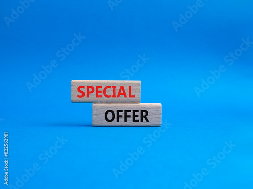 Special offer symbol. Concept word Special offer on wooden blocks. Beautiful blue background. Business and Special offer concept. Copy space