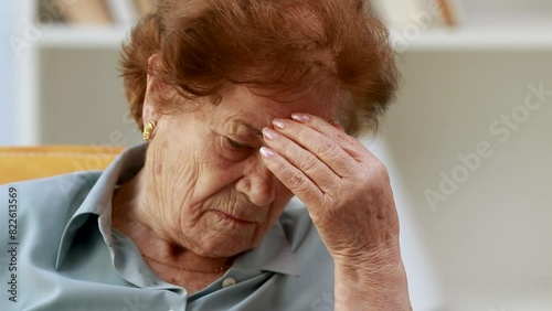 senior woman with headache or worry