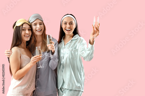 Young women in pajamas with...