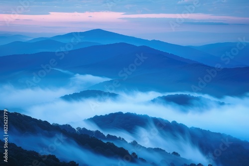 Mountains Mist. Serene Landscape of Blue Mountains Covered in Fog © Serhii